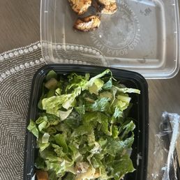 The salmon that came with my Caesar salad. Not 4 pieces and looks like somebody ate it