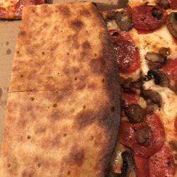Domino's Pizza - Ordered carry out and when I went home the pizza was burnt and not acceptable. Was told this is what you get when ordering thin crust! What?