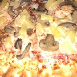 Pizza with hair on the mushroom