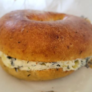 Terra Bagels - My cheese and Italian seasoning bagel with kale, chive and artichoke schmear - Bagels Near Me - Grand Rapids, Michigan Terra Bagels - My cheese and Italian seasoning bagel with kale, chive and artichoke schmear - Bagels Near Me - Grand Rapids, Michigan