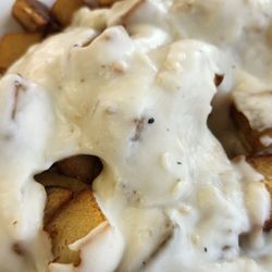 La Paz Diner - Biscuits and gravy with American fries