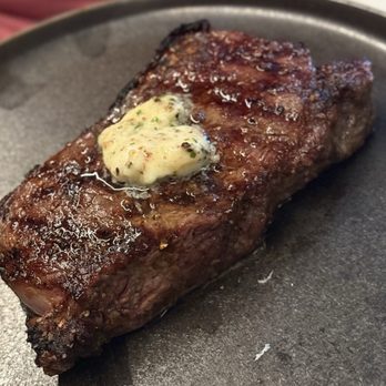 Raven - Melt in your mouth NY strip, it came with a flite of different steak sauce toppings!! Yum!! - Steakhouses Near Me - Maryville, Tennessee Raven - Melt in your mouth NY strip, it came with a flite of different steak sauce toppings!! Yum!! - Steakhouses Near Me - Maryville, Tennessee