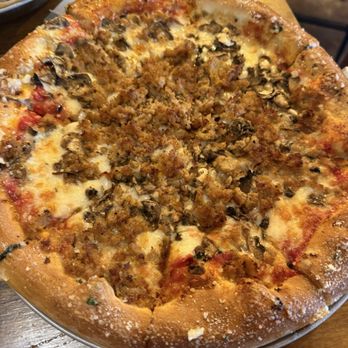 Heroes Bar & Grill - Huge Pizza with garlic crust - New American Near Me - Fullerton, California Heroes Bar & Grill - Huge Pizza with garlic crust - New American Near Me - Fullerton, California