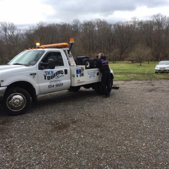 Tks Towing Service - TK's Towing Services moving a car out of the mud in a slippery situation - Towing Near Me - Haddon Township, New Jersey Tks Towing Service - TK's Towing Services moving a car out of the mud in a slippery situation - Towing Near Me - Haddon Township, New Jersey