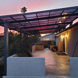 Ohana Exteriors - TLG Model Ohana Shade. Roof mounted to provide desirable  height.