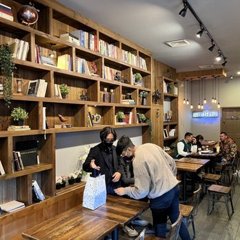 Caffe Bene - people sitting at tables in a coffee shop - Coffee & Tea Near Me - New York, New York
