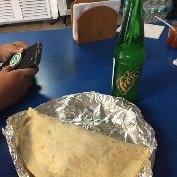 Mmabe's Cafe - a burrito and a bottle of beer - Breakfast & Brunch Near Me - Homestead, Florida Mmabe's Cafe - a burrito and a bottle of beer - Breakfast & Brunch Near Me - Homestead, Florida