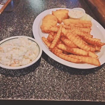 Junction Tavern - a plate of fish and chips and a bowl of coleslaw - Bars Near Me - Canton, Ohio