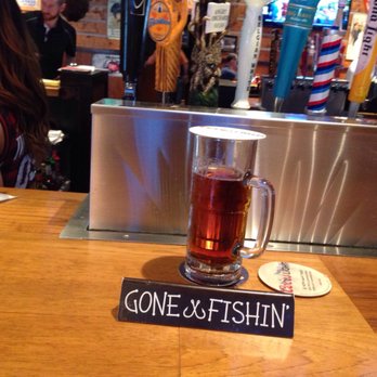 Twin Peaks - Best way to tell folks "don't take my bar seat...I'm just in the restroom."  They have special signs they put at your seat. - Sports Bars Near Me - Orlando, Florida