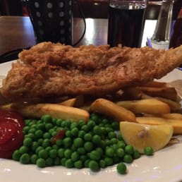 Fish and chips plate with my own healthy dollop of ketchup. Fish and chips plate with my own healthy dollop of ketchup.