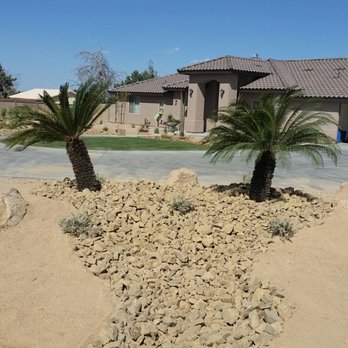 Green Valley Landscape Development - Sago palms with dry riverbed and decomposed granite. - Landscaping Near Me - Hesperia, California Green Valley Landscape Development - Sago palms with dry riverbed and decomposed granite. - Landscaping Near Me - Hesperia, California