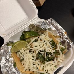 2 chicken tacos with cheese 2 chicken tacos with cheese