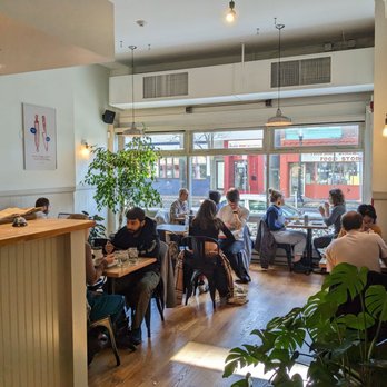Bōm Dough - One large seating area by kitchen - Breakfast & Brunch Near Me - Cambridge, Massachusetts Bōm Dough - One large seating area by kitchen - Breakfast & Brunch Near Me - Cambridge, Massachusetts