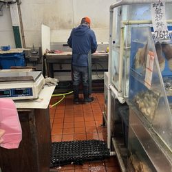 M & P Seafood Market - Cleaning our frogs