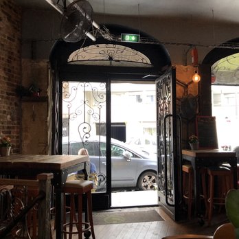 La Souris Verte - A few tables outside and a handful of pub tables and dinner tables. - Nightlife Near Me - Paris, 75