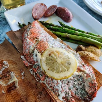 Doc's Marina Grill - Cedar plank wrapped salmon - American Near Me - Bainbridge Island, Washington Doc's Marina Grill - Cedar plank wrapped salmon - American Near Me - Bainbridge Island, Washington