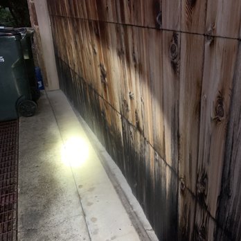 Lake Travis Overhead Doors - Bent panel vs the normal "line" on the concrete. - Garage Door Services Near Me - Lakeway, Texas Lake Travis Overhead Doors - Bent panel vs the normal "line" on the concrete. - Garage Door Services Near Me - Lakeway, Texas