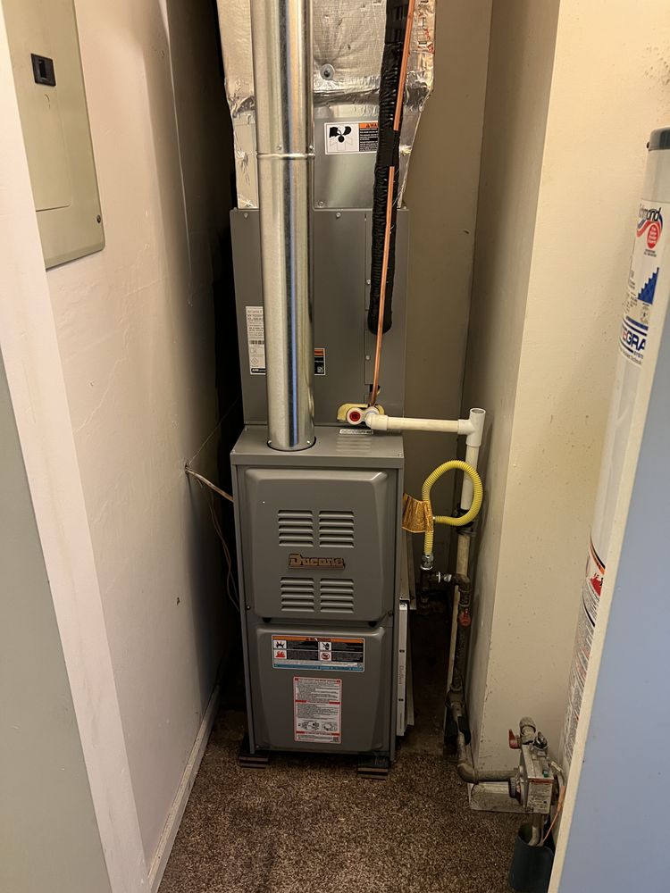 Slide of Doug's Plumbing & Heating