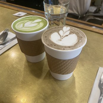 Davelle - Matcha Latte (left) Hojicha Latte (right - Japanese Near Me - New York, New York Davelle - Matcha Latte (left) Hojicha Latte (right - Japanese Near Me - New York, New York