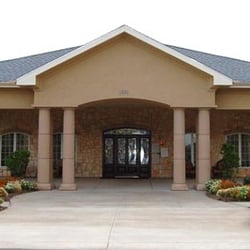 REGENT CARE CENTER - Entry way and outdoor seating area.