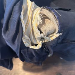 Ivory Cleaners - Torn suit. Wasn't when it was given to ivory cleaners