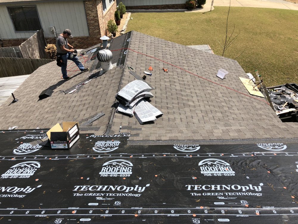 Slide of All About Roofing & Construction