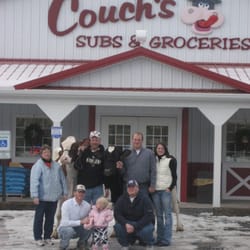 Couch's Subs & Grocery - Couch Family in front of Store