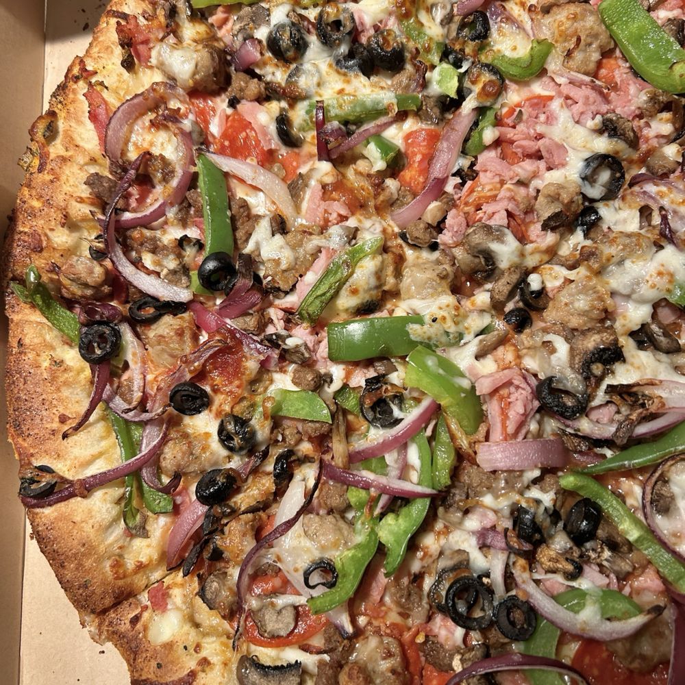 Hungry Howie's Pizza - Large The Works pizza with garlic herb crust - Pizza Near Me - Peoria, Arizona Hungry Howie's Pizza - Large The Works pizza with garlic herb crust - Pizza Near Me - Peoria, Arizona