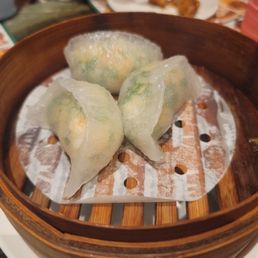 Steamed shrimp and leek(?) dumplings. Steamed shrimp and leek(?) dumplings.