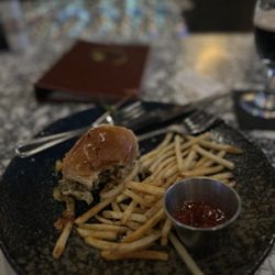 Jack Rose Social Club and Casino - A burger with fries and a side of ketchup