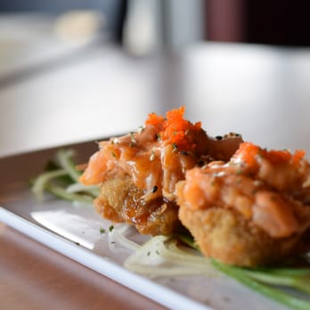Fusion Sushi - a plate of food on a table - Japanese Near Me - Calgary, Alberta