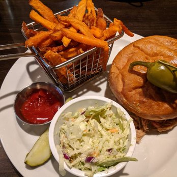 The Ranch House - Pulled pork sandwich with spicy coleslaw on the side and sweet potato fries - American Near Me - Santa Fe, New Mexico The Ranch House - Pulled pork sandwich with spicy coleslaw on the side and sweet potato fries - American Near Me - Santa Fe, New Mexico