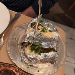 AG - The most amazing baked potatoes, that are included in the meal.