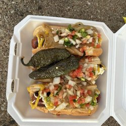 Hot Dogs El Buda - I didn't think that mayonnaise would work on a hot dog with mustard, grilled onions and pico de gallo, but it was delicious!