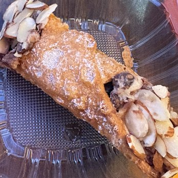 Pastaphony Fullerton - Chocolate chip cannoli with Almonds - Italian Near Me - Fullerton, California Pastaphony Fullerton - Chocolate chip cannoli with Almonds - Italian Near Me - Fullerton, California