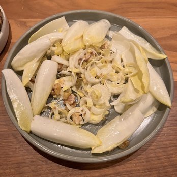 Elske - Underneath the Endive cover: pickled raisins, walnuts, sherry dressing - Scandinavian Near Me - Chicago, Illinois