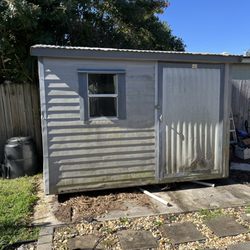 SCY Maintenance and Repairs - Before: outdoor shed.