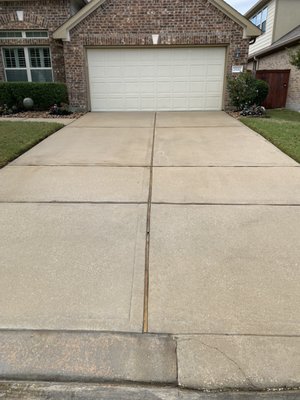Before and After Driveway Cleaning! - This is an extensive residential driveway cleaning package that consist of blowing driveway clear of debris before applying chemicals to remove mold, mildew, and algae to give your concrete a pristine finish. All driveway cleanings includes the sidewalk, walkways and curbs! Before and After Driveway Cleaning! - This is an extensive residential driveway cleaning package that consist of blowing driveway clear of debris before applying chemicals to remove mold, mildew, and algae to give your concrete a pristine finish. All driveway cleanings includes the sidewalk, walkways and curbs!