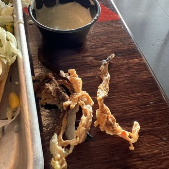 Condado Tacos - This was in my nachos. Fat from the chicken. - Tacos Near Me - Troy, Michigan Condado Tacos - This was in my nachos. Fat from the chicken. - Tacos Near Me - Troy, Michigan