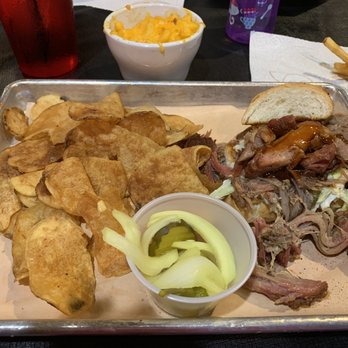 Gettin' Basted - Memphis Sandwich (pulled pork, slaw, pickles, bbq sauce) with house chips - Barbeque Near Me - Branson, Missouri Gettin' Basted - Memphis Sandwich (pulled pork, slaw, pickles, bbq sauce) with house chips - Barbeque Near Me - Branson, Missouri