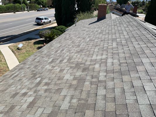 New Shingle Roof Process - Remove old wood shake roof, install new plywood decking, install new shingle roof blend.