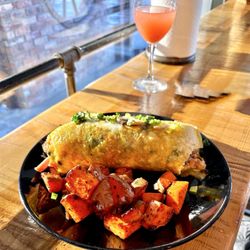 Southfork 1848 Eatery and Bakeshop - Veggie omelet with ham and country sweet potatoes.