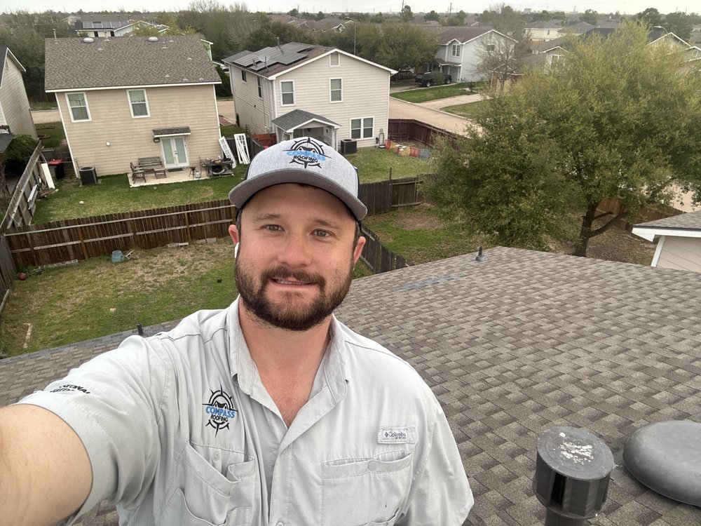 Slide of Compass Roofing