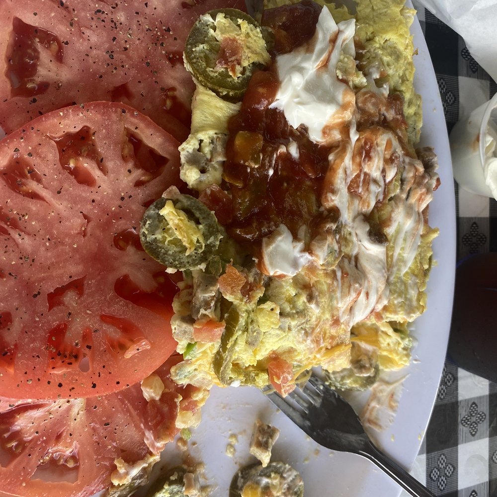 Mexicana Omelette with salsa & sour cream plus a side of tomatoes.....yummy! Mexicana Omelette with salsa & sour cream plus a side of tomatoes.....yummy!