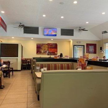 Huddle House - people sitting at tables in a restaurant - American Near Me - Townsend, Georgia Huddle House - people sitting at tables in a restaurant - American Near Me - Townsend, Georgia