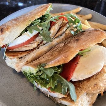 Kecco's Neapolitan Woodfire Kitchen - POLLO TOSCANO PANINI - grilled chicken, pesto, arugula, mozzarella & roasted peppers - Italian Near Me - Reisterstown, Maryland Kecco's Neapolitan Woodfire Kitchen - POLLO TOSCANO PANINI - grilled chicken, pesto, arugula, mozzarella & roasted peppers - Italian Near Me - Reisterstown, Maryland