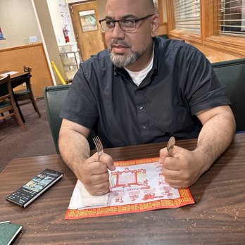 Canton Chinese Restaurant - My brother, waiting (kinda) patiently for our order to be taken... - Chinese Near Me - Visalia, California