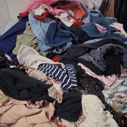 Deja Vu Thrift Store - Heaps of clothes you have to dig through.
