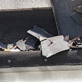 Heritage Builders - Lit cigarettes thrown in our gutter during installation - Roofing Near Me