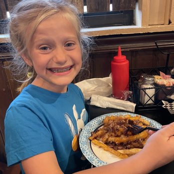 Smokies BBQ - Aria enjoying her fries and brisket with cheese. - Barbeque Near Me - Broken Arrow, Oklahoma Smokies BBQ - Aria enjoying her fries and brisket with cheese. - Barbeque Near Me - Broken Arrow, Oklahoma